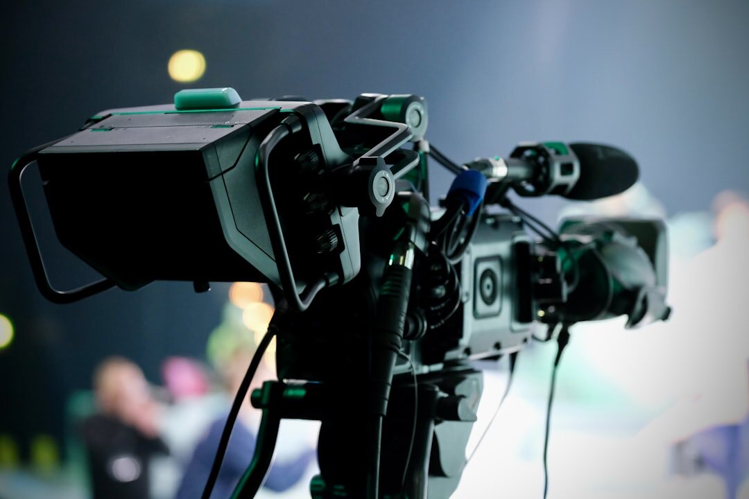 TV journalist presenting live news in a broadcast studio